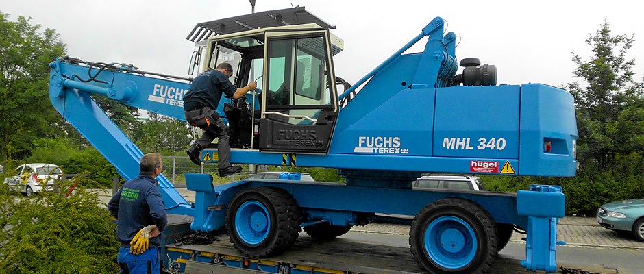 <h3>Unser Fuchs-Bagger mit Schalengreifer</h3>